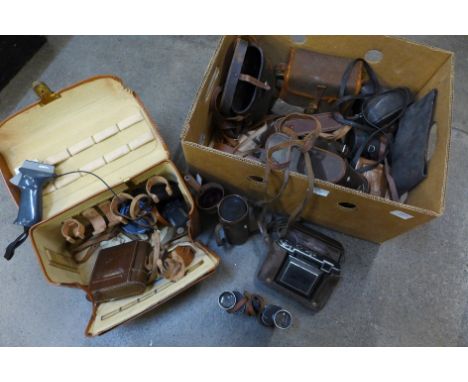 A collection of cameras incl. Ensign, Zeiss Ikon, Lancaster &amp; Thorpe binoculars, Pentax camera, etc. 