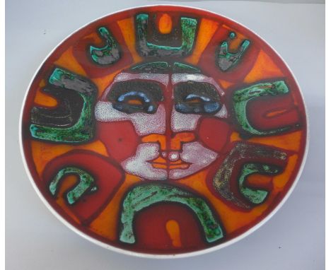 A Poole Delphis plate; 27cm diameter 