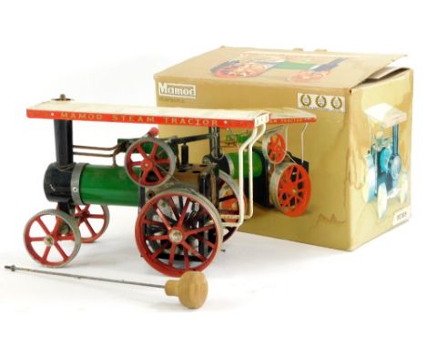 A Mamod steam tractor, in black and green livery, with original box.