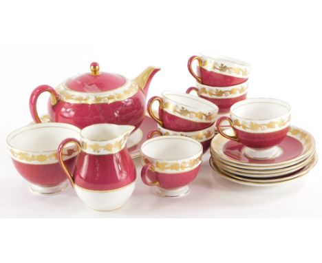 A Wedgwood Whitehall pattern part tea service, to include tea pot, milk jug, sugar bowl, cups and saucers, each with a mottle