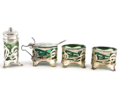 A silver mounted four piece Art Nouveau cruet set, with green glass liners.