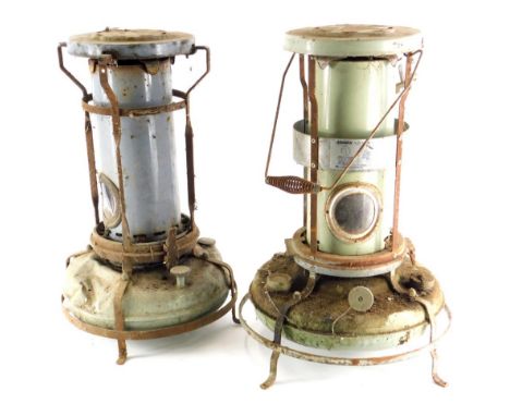 An Aladdin blue flame heater, with green enamel paint, and another similar with blue. (2)