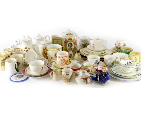 A collection of Royal Commemorative china, enamel beakers, a pair of Royal Worcester candle snuffers, Queen Victoria and Prin