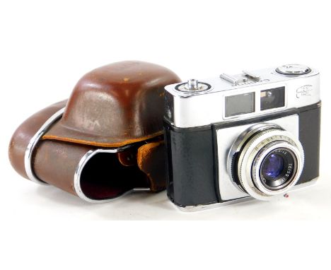 A Zeiss Ikon Contina camera, with 1:2.8/45 lens, 8cm high, and an associated case.