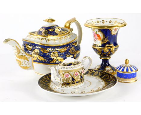 Two two-handled urn shaped vases, with bleu de roi and gilt decoration and an English porcelain teapot with similar decoratio