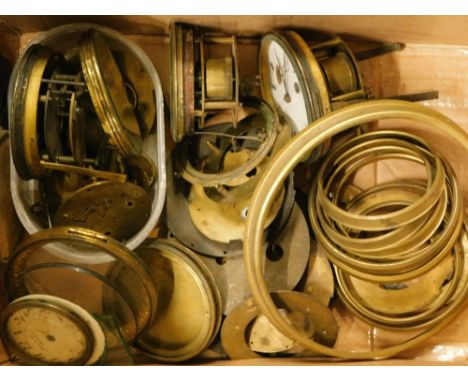 Various clock parts, mainly dials and bezels, etc.