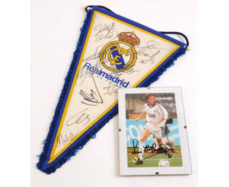 A collection of Real Madrid Football Club memorabilia, to include a signed pennant, with certificate from Bid 4 Sport, bearin