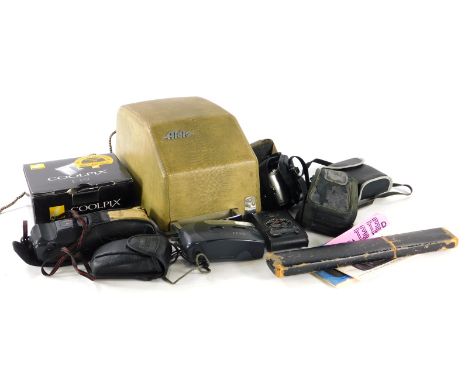 Various scientific instruments, binoculars, etc., an AW Faber slide rule, 31cm wide, Coolpix L19 camera, other cameras, Yashi