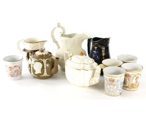 Two royal commemorative teapots, five enamel Victoria and later mugs, and various jugs to include George IV.