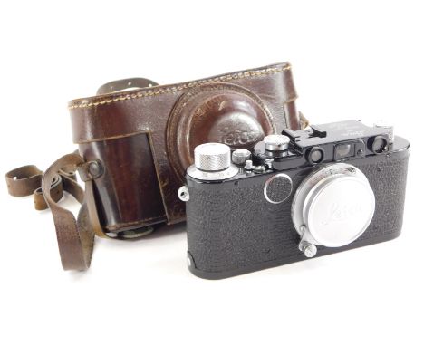 A Leica camera, with black body, believed by the Leica Society to be a Leica II conversion, serial number 20916, with a Leitz