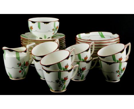A Mintons Art Deco style part tea service, each piece decorated with flowers, leaves, etc., some pieces. (AF)