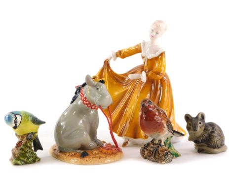 A collection of ceramic figures, to include a Royal Doulton Eeyore figure, Royal Doulton Lady Kitty, two Beswick birds and a 