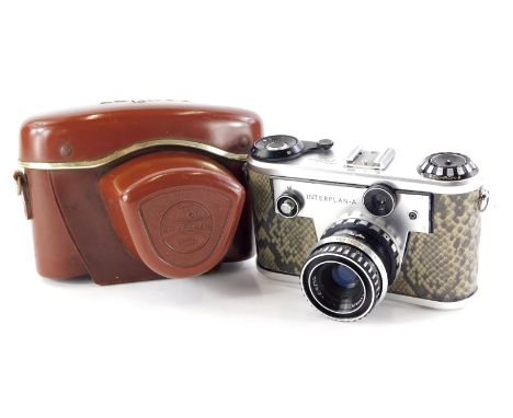 A Corfield Periflex Interplan A camera, with a faux snakeskin body, and a 50mm f2.8 Lumar lens, in a leather case.