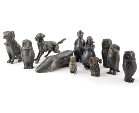 A collection of pewter novelty cruets, etc., to include dogs, owls and a shoe shaped snuff box, etc.