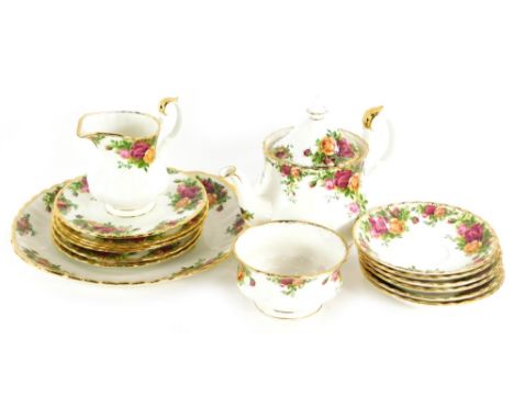 A Royal Albert Old Country Roses pattern, milk jug, sugar bowl, side plates, saucers, and a teapot (AF).