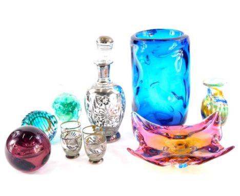 A collection of coloured art glass, to include a Whitefriars style turquoise vase, an apple shaped paperweight, etc.