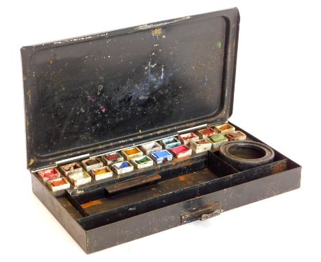 A late 19thC toleware artist's paint box, the hinged lid later written 'Tea' four times, enclosing twenty contemporary cerami