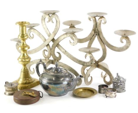 A collection of metalware, to include a pair of silvered metal candle stands, plated teapot, tape measure, etc. 