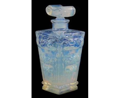 A Sabino opalescent art glass scent bottle and stopper, of tapering form decorated with scrolls, etc., stamped to underside M