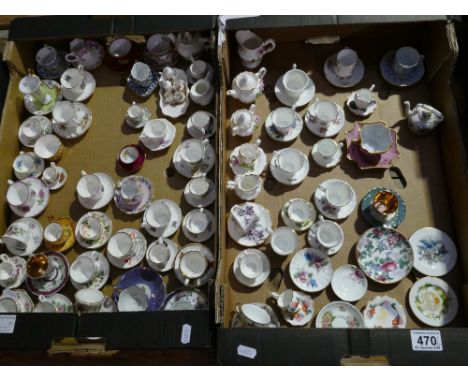 A collection of pottery miniature cup and saucers including tea sets, Limoges,floral, plates, teapots etc ( 2 trays approx 10