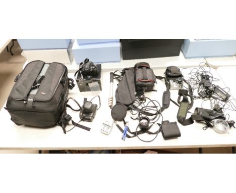 A collection of camera equipment to include LowePro camera backpack, Fujifilm Fine Pix S1 bridge camera(no charger) Ashi Pent