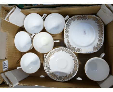 A Clarice bone china gold leaf part tea set to include 6 cups &amp; saucers and side plates (1 tray)