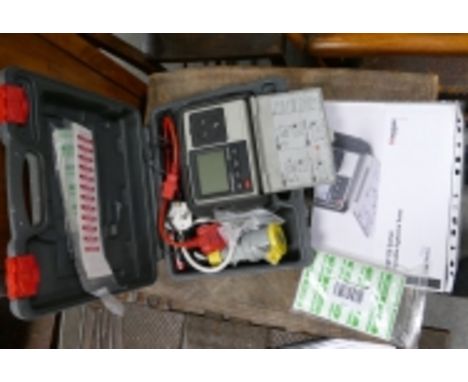Meggar branded PAT120 Series portable appliance tester alongside a TES branded light meter (2)