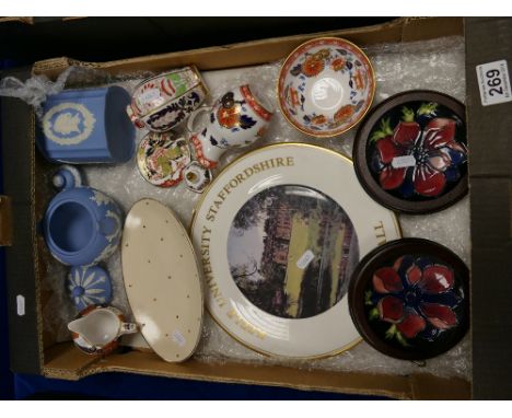 A mixed collection of ceramic items including - silver lined Moorcroft decorative wall plaque, Spode gilded water jug, miniat