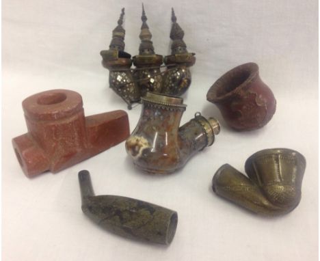 A collection of antique smoking pipe bowls. To include natural jasper, triple oriental bowl with mother of pearl detail and a