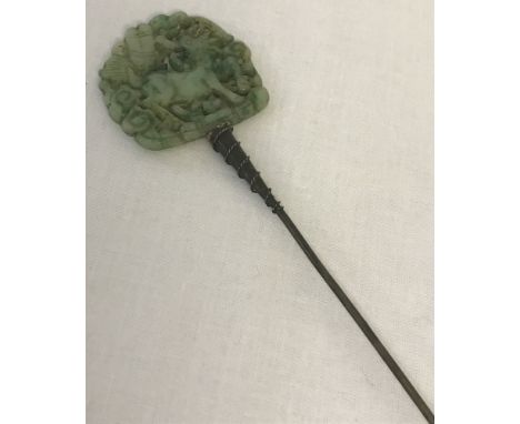 A vintage decorative pierced work, jade hat pin, depicting a goat.  