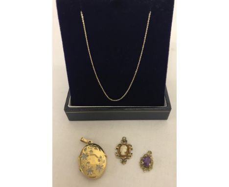 3 9ct gold pendants together with a 10ct gold fine belcher chain. A small cameo in decorative surround, a small oval cut amet