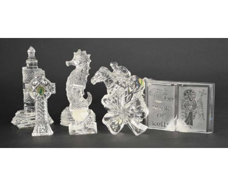 A collection of Waterford Crystal models, with original boxes, comprising a jockey on horse, model of an ink quill, a Book of