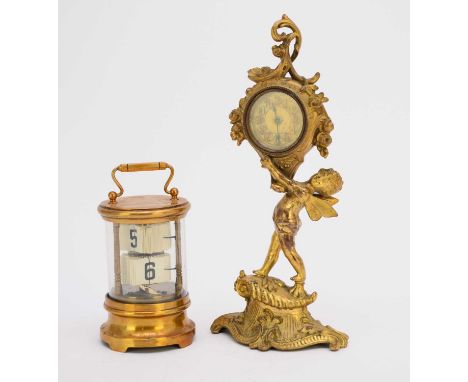 An Ansonia American gilt metal figural desk timepiece, first quarter 20th centuryOf rococo revival form, the movement suspend