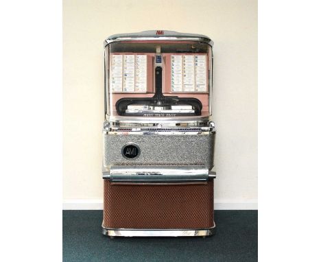 An Ami Jukebox Model JBH-120, circa 1957 Serial number 381893, with nickel/dime, quarter and half dollar plays, 120 45rpm rec