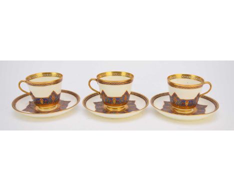 A Davenport part coffee service, circa 1870-86, decorated in the Persian style with simulated red jewels in gold borders to t