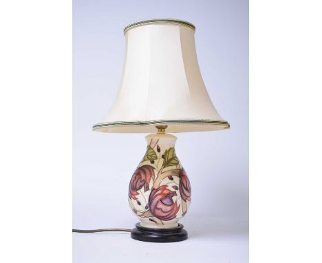 A Moorcroft lamp in the 'Pirouette Breeze' pattern designed by Emma Bossons, 22.5cm high including base but excluding fitting