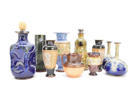 A group of assorted Royal Doulton and Doulton Lambeth stoneware, including a Royal Doulton Art Nouveau decanter with silver s