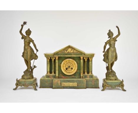 A French onyx and gilt metal clock garniture, circa 1900Of architectural form, the 3.7 inch dial with Arabic chapter, the Jul