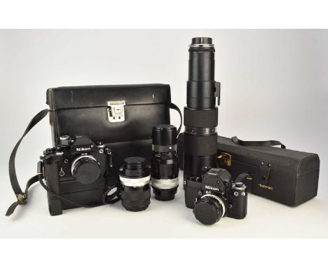 A collection of roll film cameras and lensesTo include: Two Nikon F2 35mm SLR camera bodies, circa early 1970s, together with