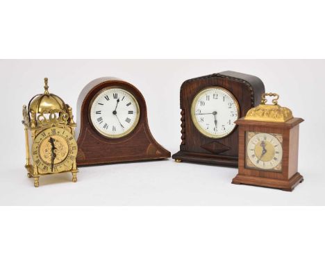 Four various 20th century mantel clocksIncluding: A brass reproduction miniature lantern clock by Smiths, 17cm high; a miniat