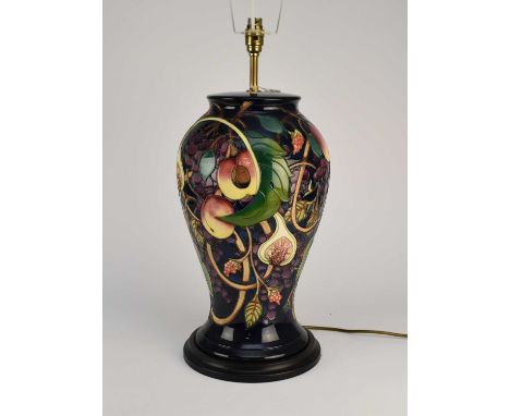 A Moorcroft large baluster table lamp in the 'Queen’s Choice' pattern designed by Emma Bossons, 44.5cm high including the bas