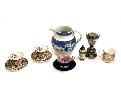 A mixed lot of ceramics to include jasperware jug, Vienna porcelain twin handled urn on pedestal, 2 Royal Albert teacups and 