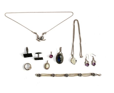 A small quantity of silver jewellery to include modernist bark effect cufflinks; labradorite cabochon pendant; amethyst earri