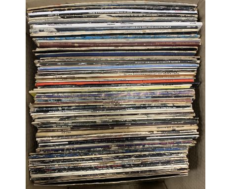 A mixed lot of vinyl LPs to include Queen, Paul McCartney; Four Tops; Bob Dylan; Alice Cooper; Simon &amp; Garfunkel; The Hol