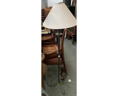 A wrought iron standard lamp with shade, 135cmH 