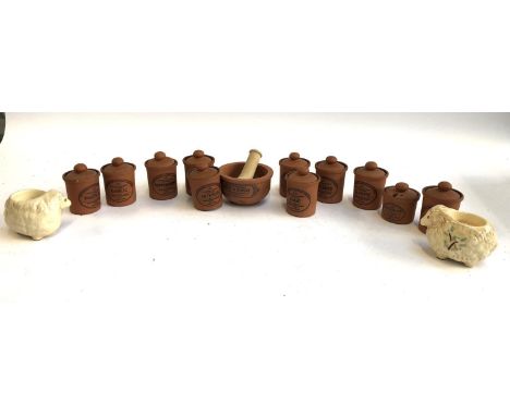 A quantity of Henry Watson herb jars, together with a pestle and mortar and 2 ceramic tea light holders in the form of sheep 