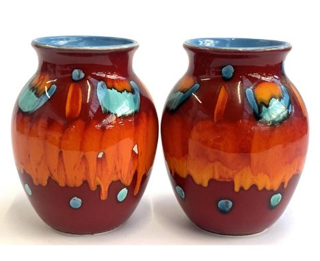 A pair of Poole Pottery Volcano vases, each 25cmH 