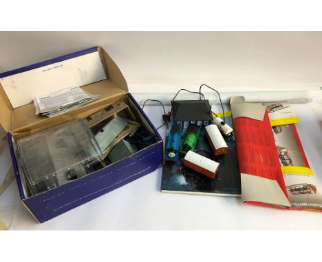 A quantity of Hornby locomotives and accessories to include Thomas the Tank Engine, Henry, Station Terminus R8009, receiver x