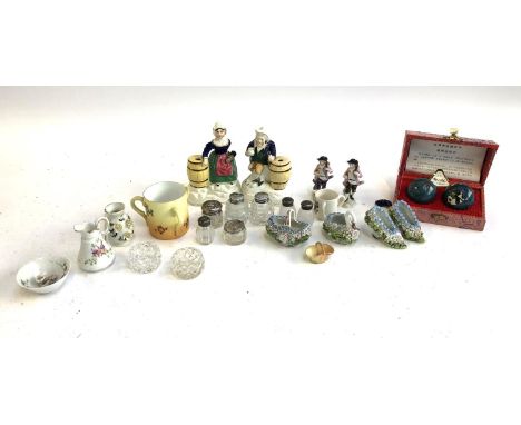 A mixed lot of ceramics to include include cut glass salts, silver topped ointment tops, Staffordshire figures, floral encrus