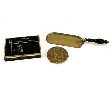 Walter Henry Gilbert (1871 - 1946), a circular bronze Bromsgrove guild plaque; together with a brass crumb sweeper with treen
